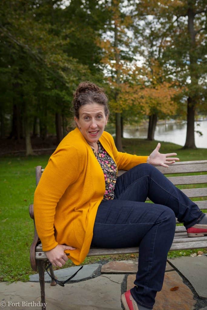 Old Mom getting up from a bench.