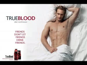 True Blood Promotional Still of Vampire Eric Northman lying seductively on a white sheet.